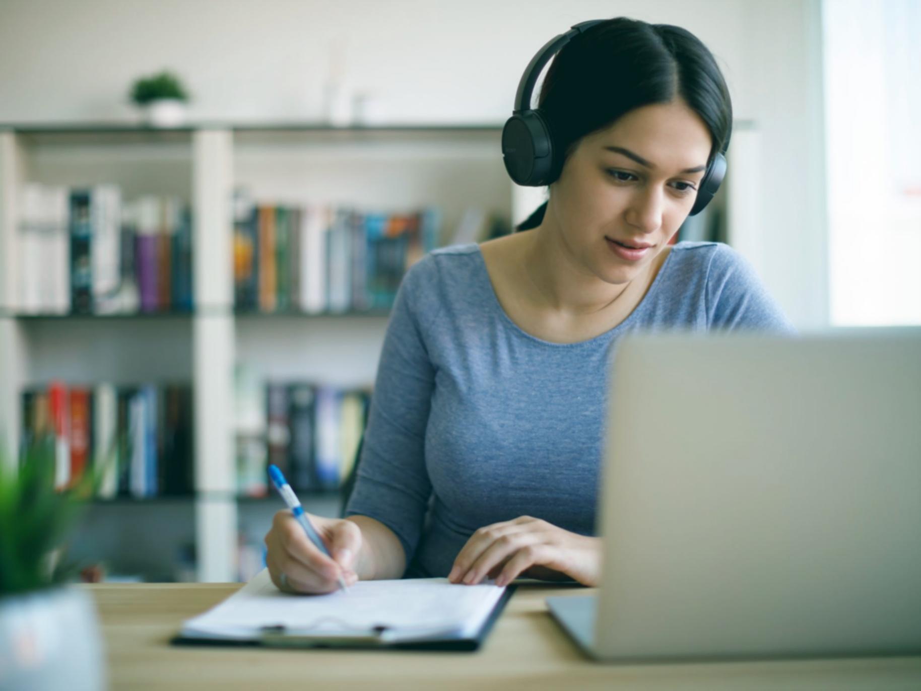 Students analyzing narrative structure in a workshop setting with text examples on display